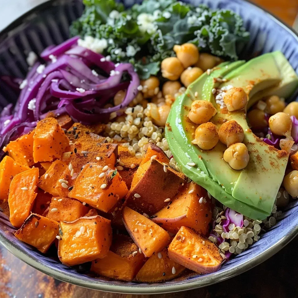 A close-up view of a colorful Middle Eastern Buddha bowl filled with fresh ingredients.