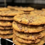 Close-up of freshly baked cookies made in an air fryer, showing chocolate chips melting.